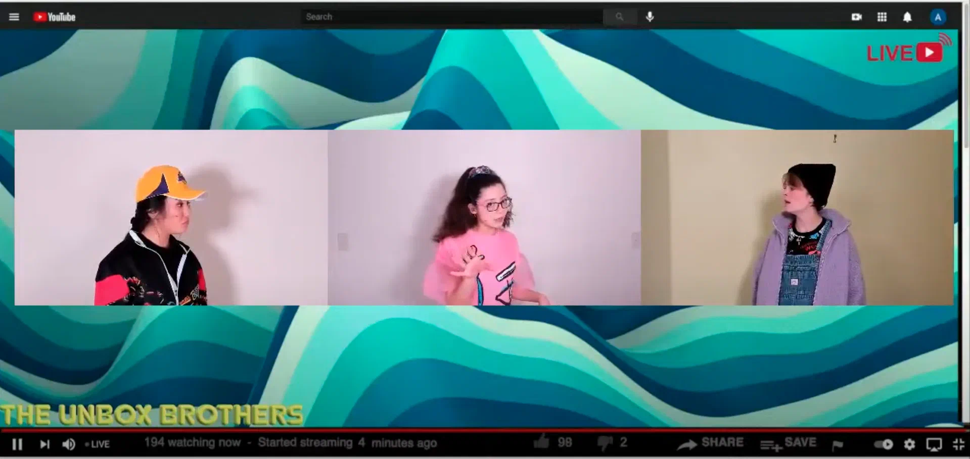 Three remote performers appear within a colorful online broadcast frame.